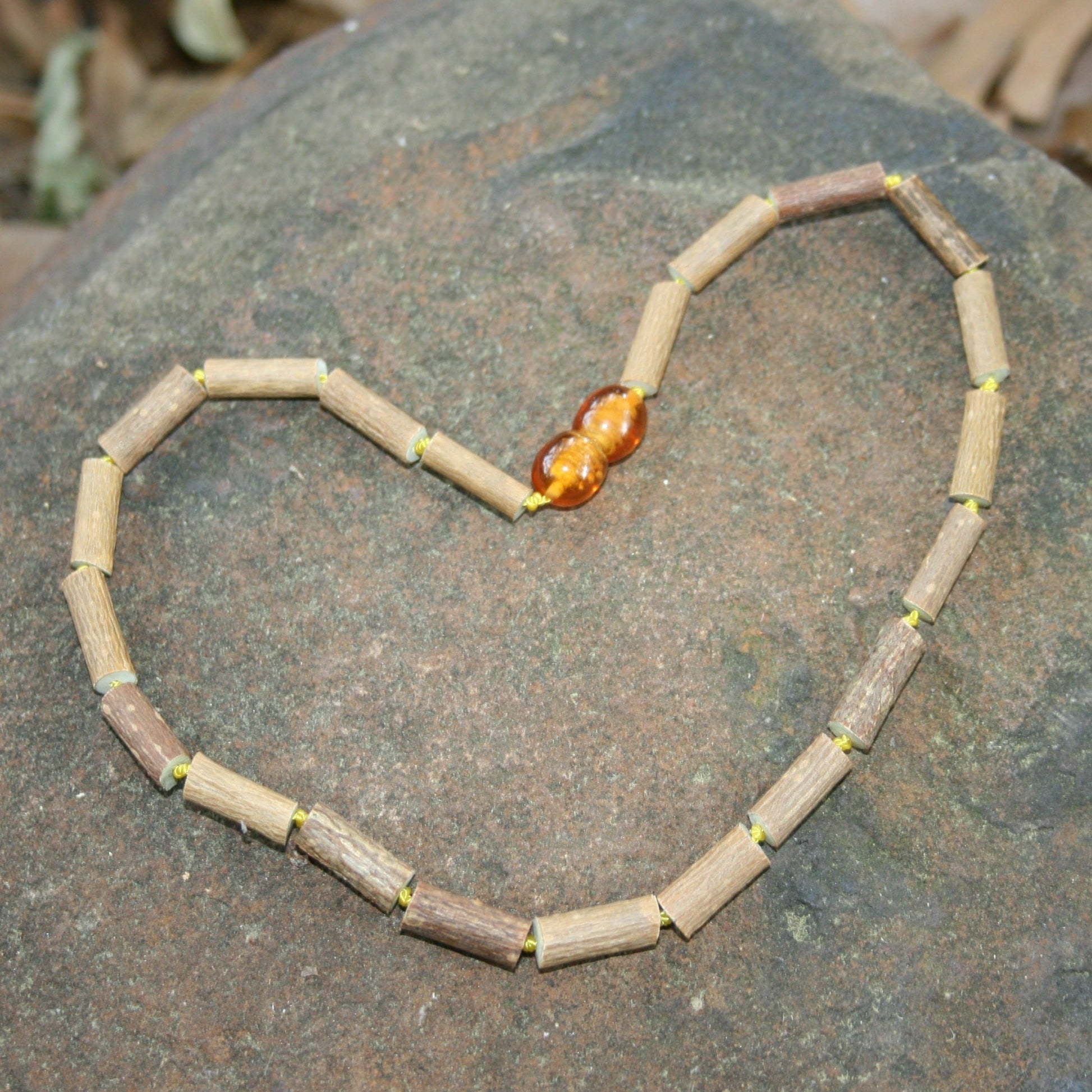 All Hazelwood Necklace, Bracelet, or Anklet, - Any Style, Any Length (children and adult sizes) - necklace / bracelet on rock background - Hazelwood variation safety clasp or screw clasp
