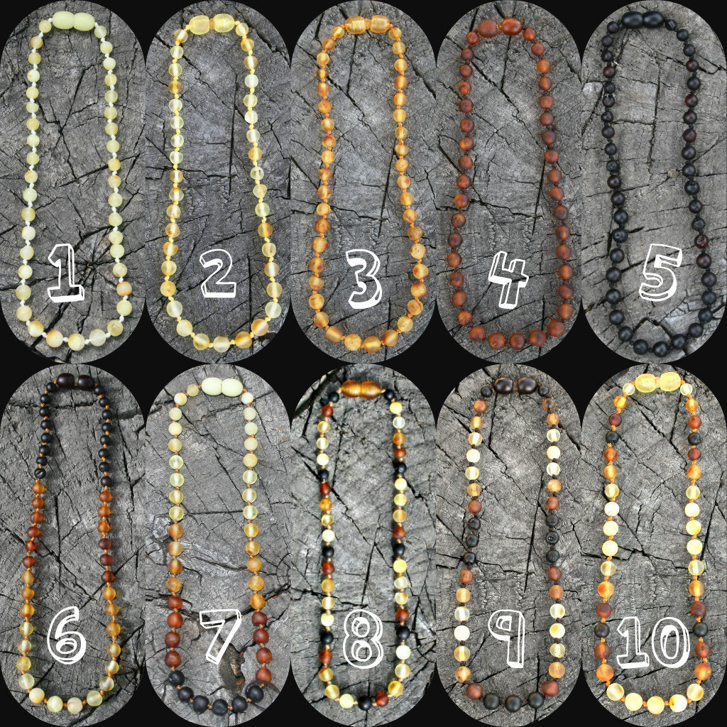 Picture is with multiple variations colored amber-Baltic Amber Trach Chain, Healing Jewelry, Unpolished & Raw, Trach Strap, Trach Holder (baltic amber variation bracelet / necklace on wooden background)