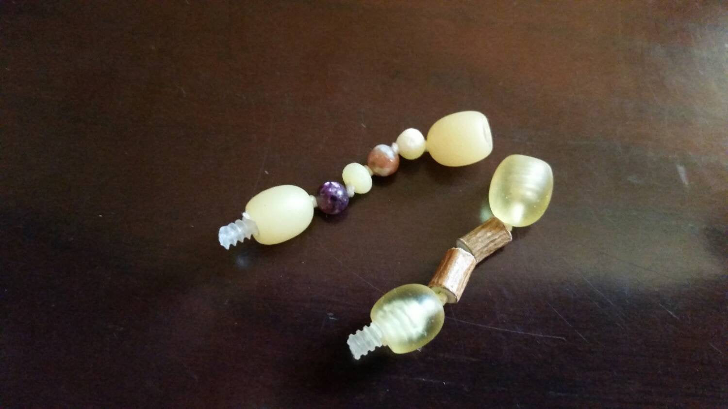 Picture 3 is of a 1.5" super calming girl and a 1" hazelwood extender with screw clasps.