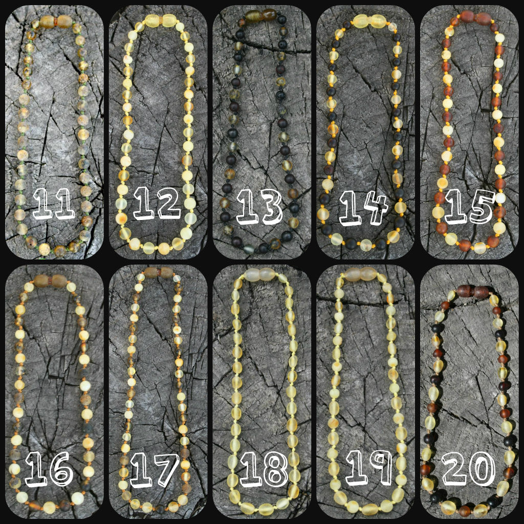 Picture is with multiple variations colored amber-Baltic Amber Trach Chain, Healing Jewelry, Unpolished & Raw, Trach Strap, Trach Holder (baltic amber variation bracelet / necklace on wooden background)  Edit alt text