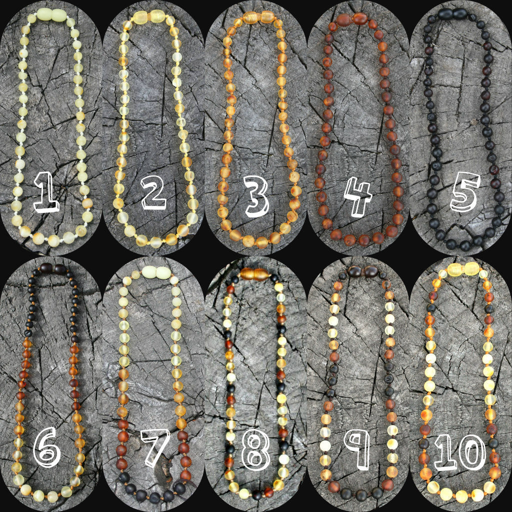 Picture is with multiple variations colored amber-Baltic Amber Trach Chain, Healing Jewelry, Unpolished & Raw, Trach Strap, Trach Holder (baltic amber variation bracelet / necklace on wooden background) 